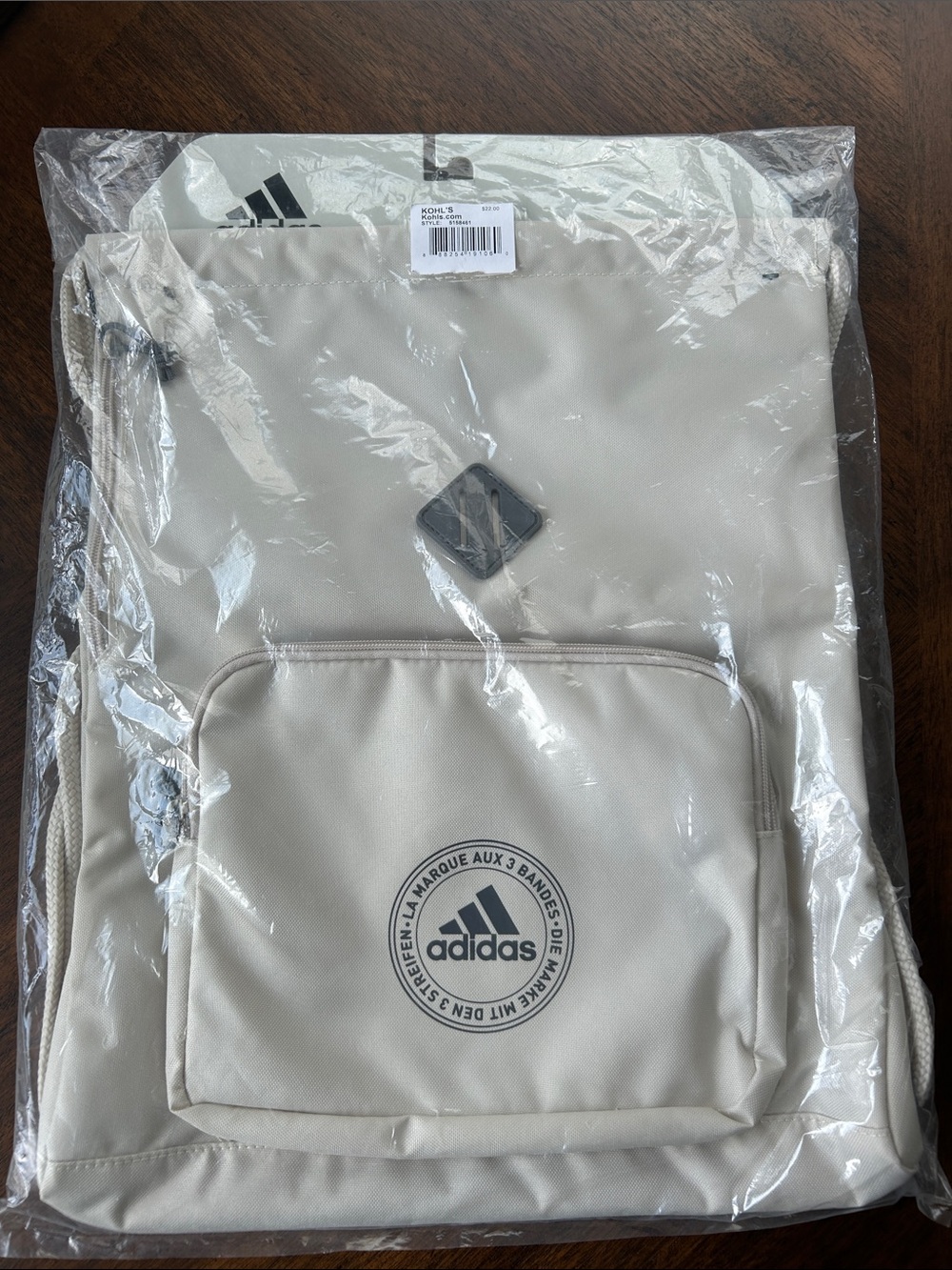 Adidas Off-White Drawstring Sling Backpack with Front Zip Pocket. BRAND NEW!